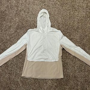 Light weight quarter zip jacket by Lululemon. Size Large. Athletic fit.